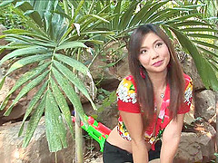Tantalizing Japanese milf enjoys the good nature while making fin with a dildo